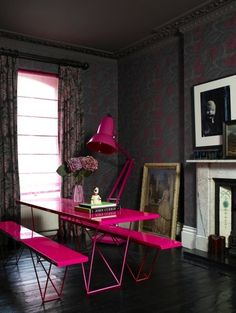 Charcoal interior with pop of hot pink makes for a sophisticated but fun space